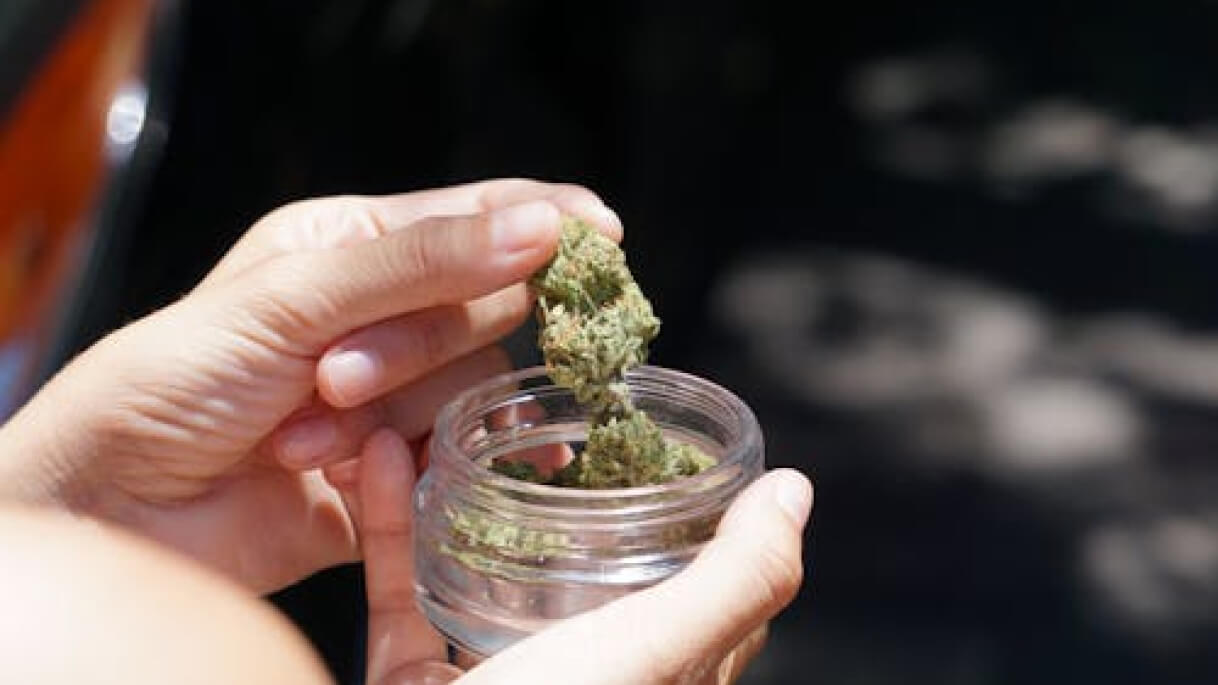 Small dose of cannabis on a neutral surface
